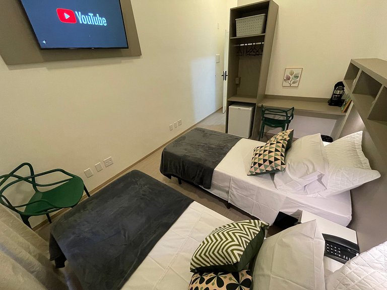 Suíte Tranquila e Funcional para Dois
